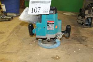 lot 107 image: Makita Router 3612C
