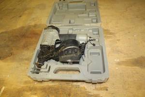 lot 102 image: Porter-Cable Pneumatic Roofing Coil Nailer 11GA RM175,  Case
