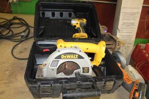 lot 214 image: DeWalt 18V Cordless 6-34 Metal Saw DW934, 18V Cordless 14 Impact Driver DC825, Carry Case