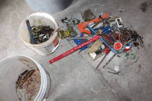 lot 373 image: Misc. Saw Blades, Hand Tools, ChainsParts, Drill Bits, Wrenches, Caulk Gun, Chain Hooks and More
