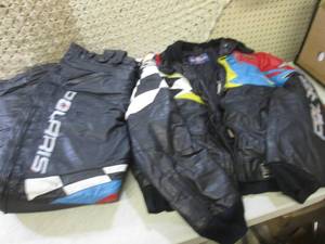 lot 38 image: Polaris Snowmobile Jacket and Pants...