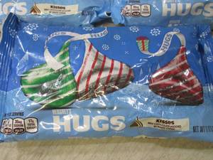 lot 83 image: 3 Bags of Hersheys Hugs Best by Aug...