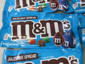 lot 91 image: 12 Bags of Hazelnut Spread M&Ms Be...