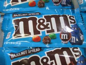 lot 92 image: 12 Bags of Hazelnut Spread M&Ms Be...