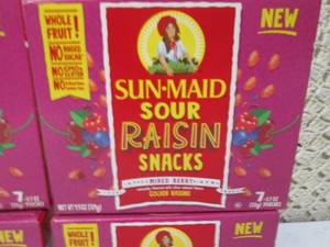 lot 105 image: 4 Boxes of Sun-Maid Sour Raisin Sna...