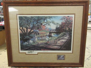 lot 712 image: NARY A CARE BY KEN ZYLLA HAND SIGNED COMMEMORATIVE PRINT WITH 1986 STAMP