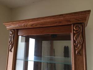 lot 193 image: Lighted Oak China Cabinet With Sliding  Locking Door