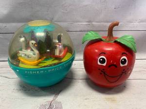 lot 10 image: Roly Poly #165 Chime Ball & 1972 Fisher Price Happy Apple