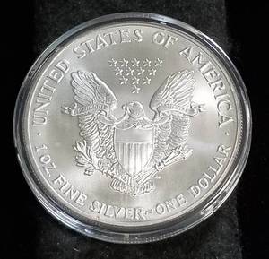 1990 AMERICAN SILVER EAGLE 1 TROY OZ. .999 FINE SILVER IN AIRTITE