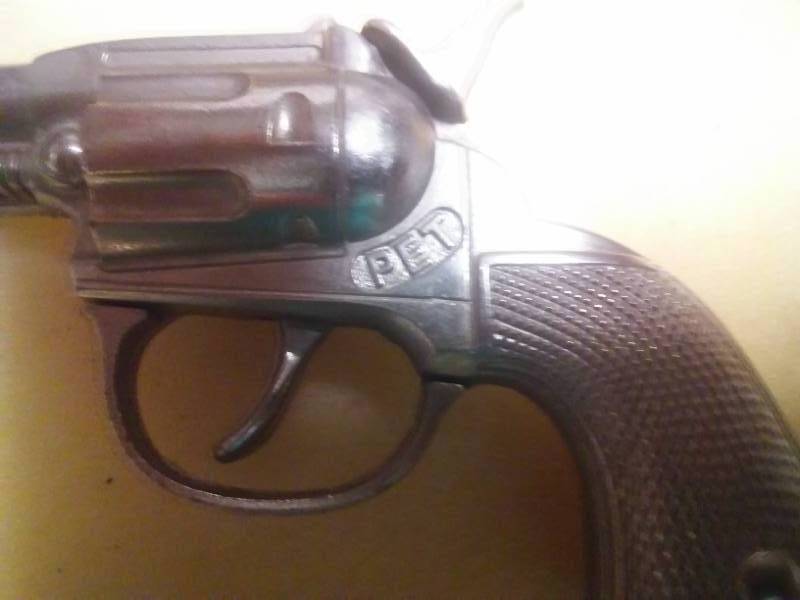 2 toy pistols - Hubley PET & Indian head cap gun