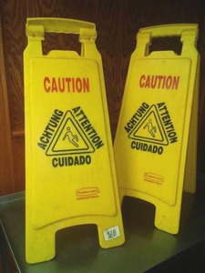 2 Rubbermaid Wet Floor Caution Signs.