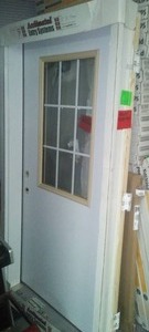 NEW 42 in. x 80 Framed Exterior Bayer Door with window.