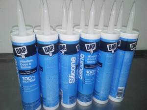 12 DAP Silicone Caulk.