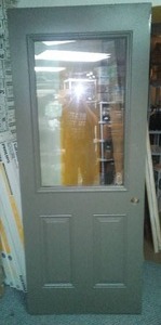 New Bayer exterior door 32 with window.
