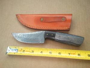 8.5 in. Knife, angled Blade and leather sheath