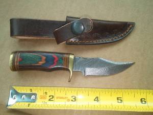 6 In. Knife � Multicolored Wood Handle and Leather Sheath.