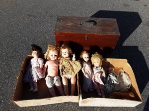 lot 18 image: Wood Chest On Casters 27x11x15 & Creepy Old Baby Dolls