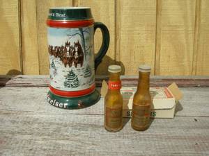lot 33 image: Vintage Budweiser Shakers & Holiday Stein