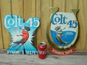 lot 36 image: 2 Colt 45 Embossed Signs
