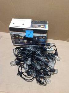 lot 7 image: 24-Bulb 48 ft. Vintage Cafe Integrated LED String Lights, Black &nbspin good condition 