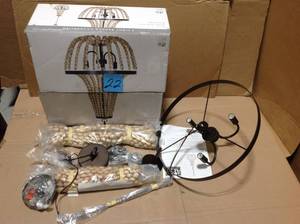 lot 22 image: 3-Light Bronze with Natural Wood Beaded Chandelier by Alsy &nbspin good condition 