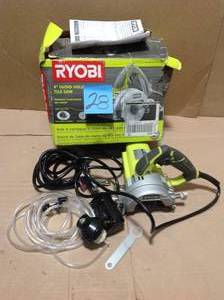 lot 28 image: RYOBI 4 in. Tile Saw &nbspin good condition 