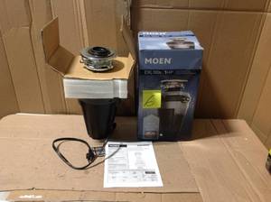 lot 6 image: MOEN Chef Series 1-HP Continuous Feed Garbage Disposal with Integrated Lighting and Sound Reduction &nbspin good condition 