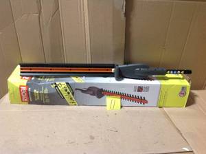 lot 11 image: Expand-It 17-12 in. Universal Hedge Trimmer Attachment &nbspin good condition 