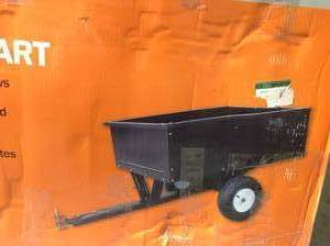 lot 19 image: Powercare 10 cu. ft. Lawn Mower Dump Cart with Wheels &nbspin good condition 