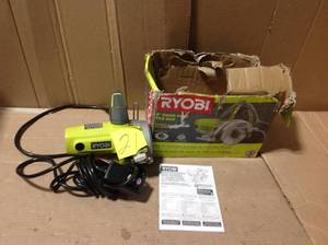 lot 21 image: RYOBI 4 in. Tile Saw &nbspin good condition 
