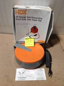 lot 35 image: HDX 30 ft. 163 Heavy-Duty Retractable Extension Cord Reel with 3-Outlets &nbspin good condition 