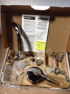 lot 43 image: Brantford 2-Handle Deck-Mount Roman Tub Faucet Trim Kit with Hand Shower in Chrome (Valve Not Included) &nbspin good condition 