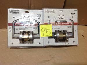 lot 95 image: Universal Hardware Commercial 2-34 in. Satin Chrome Heavy Duty Classroom Keyed Entry Door Lever
