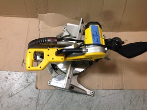 lot 108 image: DEWALT 15 Amp Corded 12 in. Compound Double Bevel Miter Saw in good conditions