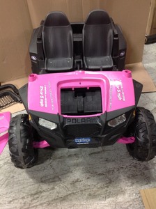 lot 114 image: Peg Perego Polaris RZR 900 Ride On, Pink used missing battery unable to tested