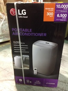 lot 115 image: LG Electronics 10,000 BTU (6,500 BTU, DOE) 115-Volt Portable Air Conditioner with Dehumidifier Function and LCD Remote in White not used