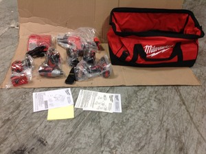 lot 116 image: Milwaukee M18 18-Volt Lithium-Ion Cordless Combo Tool Kit (4-Tool) w(2) 3.0Ah Batteries, (1) Charger, ( 1) Tool Bag not used