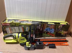 lot 1 image: RYOBI ONE Lithium 22 in. 18-Volt Lithium-Ion Cordless Hedge Trimmer - 1.5 Ah Battery and Charger Included in good conditions