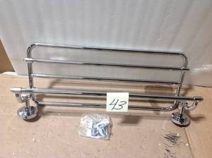 lot 43 image: ISO 10-710 in. L x 6-925 in. H x 26-1920 in. W Zinc Hotel-Style Bathroom Shelf in Chrome in good condition 