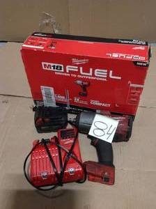 lot 84 image: Milwaukee M18 FUEL 18-Volt Lithium-Ion B Milwaukee M18 FUEL 18-Volt Lithium-Ion Brushless Cordless 12 in. Impact Wrench wFriction Ring Kit wOne 5.0 Ah Battery USED in working condition 