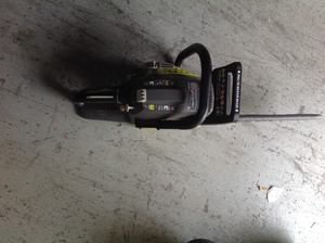 lot 110 image: RYOBI 18 in. 38cc 2-Cycle Gas Chainsaw with Heavy Duty Case in working conditions