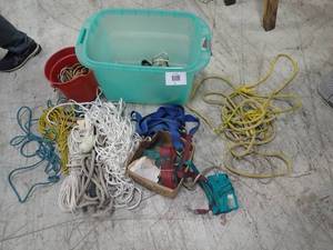 box of ropes and straps