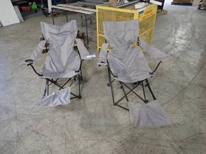 2 lawn chairs with foot rests