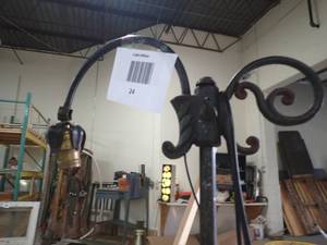pair of antique lamps, 1 looks to be cast iron possible hand made