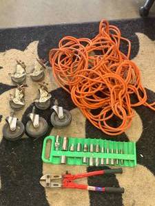 lot 37 image: Casters, Extension Cord, Tools
