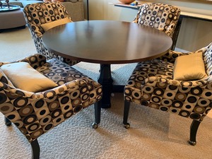 lot 10 image: Mahogany Round HighLow Table and Four Chairs