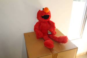 lot 22 image: Sesame Street Elmo Plush Toy 30