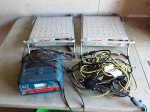 lot 34 image: 2-Little Giant Work Platforms, Battery Charger, Burger Cord Cargo Net