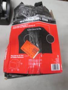 lot 35 image: 65 inch Tan Premium Grill Cover...