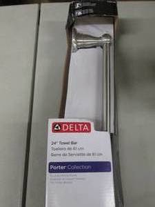 lot 52 image: Delta Porter 24 inch Towel Bar...